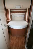 Chez Vacances et Loisirs, spécialiste du camping-car d'occasion, un nouveau camping-car intégral occasion, Lit central et de pavillon, un Autostar Passion I720 LC, à Roques proche de Toulouse (31)