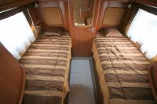 Camping-car intégral occasion, Mercedes, lits jumeaux, salon face à face, Pilote explorateur G733 FJ, à Roques près Toulouse