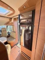Camping-car intégral occasion, poids lourd, 4 places, lits jumeaux, Carthago Chic C-Line I 4,9 LE, à Roques proche de Toulouse (31)