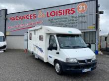 Un camping-car profilé de moins de 7 m, lit à la française, le Mc Louis Glen 363, à Roques proche de Toulouse