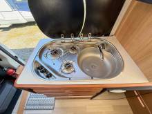 Fourgon aménagé occasion, 4 places, 3 couchages, moins de 6 m, Campérêve Magellan 540, à Roques proche Toulouse (31)