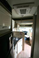Camping-car profilé occasion, véhicule presque neuf, lit de milieu et de pavillon, 4 places, PLA 390, à Roques, proche de Toulouse (31)
