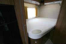 Un camping-car occasion profilé familial,u lit à la française, lit de pavillon, 5 places, Boîte automatique, Pilote P716 P,  chez Vacances et Loisirs à Roque proche de Toulouse (31)