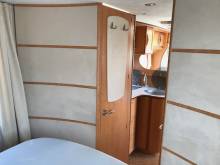 Camping-car profilé d’occasion, lit de milieu, 3 places, Fleurette Magister 73 LMS, à Roques proche de Toulouse 31