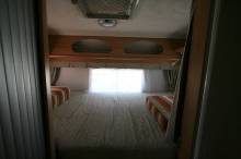 Camping-car profilé occasion, lit sur soute, 5 places carte grise, 4 couchages, Mc Louis Tandy 670 G, à Roques, proche de Toulouse (31)