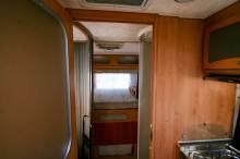 Camping-car profilé occasion, lit sur soute, 5 places carte grise, 4 couchages, Mc Louis Tandy 670 G, à Roques, proche de Toulouse (31)