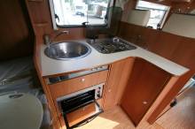 Vend Camping-car profilé d’occasion, lit à la française, lit de pavillon, moins de 7 m, Eriba Car 400 X, à Roques, proche de Toulouse 31.