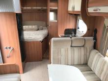 Camping-car occasion profilé, lit à la française, lit de pavillon, salon face à face, moins de 7m, Rapido 776 FF, à Roques proche de Toulouse (31)