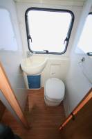 Vacances et Loisirs spécialiste du camping-car d’occasion en Midi-Pyrénées vous propose un Camping-car profilé d’occasion, lit central, 3 couchages, Rimor Katamarano 69P, à Roques proche de Toulouse (31)