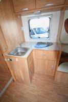 Vacances et Loisirs spécialiste du camping-car d’occasion en Midi-Pyrénées vous propose un Camping-car profilé d’occasion, lit central, 3 couchages, Rimor Katamarano 69P, à Roques proche de Toulouse (31)