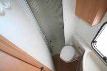 Camping-car profilé occasion, moins de 6 m, lit à la française, 4 places, Bürstner T 605, à Roques proche de Toulouse (31)