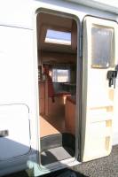 Achat Camping-car profilé occasion, moins de 6 m, lit à la française, 4 places, Bürstner T 605, à Roques proche de Toulouse (31)