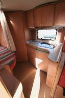 Vend Camping-car profilé occasion, moins de 6 m, lit à la française, 4 places, Bürstner T 605, à Roques proche de Toulouse (31)