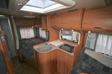 Camping-car occasion profilé, lit à la française, salon face à face, moins de 7 m, Bürstner Privilège T630, à Roques proche de Toulouse 31