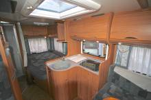 Camping-car occasion profilé, lit à la française, salon face à face, moins de 7 m, Bürstner Privilège T630, à Roques proche de Toulouse 31