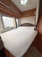 Camping-car profilé occasion, lit à la française, moins de 7 m, 4 places, roues jumelées, Vilamobil Cautel L, chez Vacances et Loisirs à Roques proche de Toulouse (31)